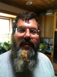 Charles Hudacko with honeycomb stuck in his beard.